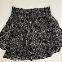 Gonna nera a pois bianchi