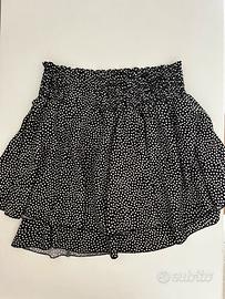 Gonna nera a pois bianchi