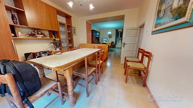 Via Grande con CORTILE