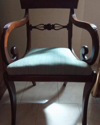 poltrona con braccioli a riccioli 