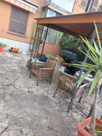 Tiburtina trilocale con giardino privato