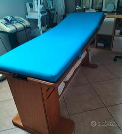 lettino per massaggi e bagni di vapore 