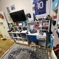 cameretta con divano letto e cabina armadio scriva