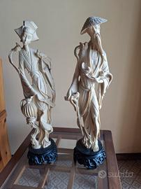 coppia di statue di fattura orientale