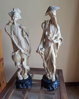 coppia di statue di fattura orientale
