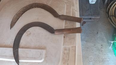 vecchie accette taglia erba manuale