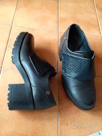 Scarpe nere con suola alta Primadonna