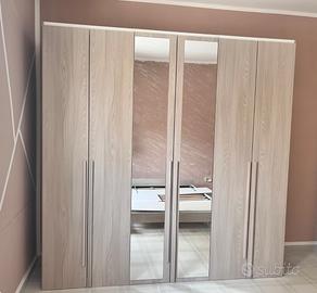 Armadio a 6 ante + Letto matrimoniale con rete