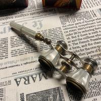 binocolo antico da teatro in ottone e madreperla