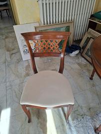 Tavolo rotondo in legno  con prolunghe e 6 sedie 