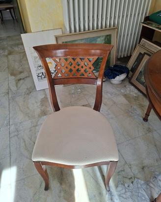 Tavolo rotondo in legno  con prolunghe e 6 sedie 
