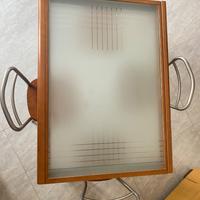 Tavolo allungabile con piano in vetro temperato