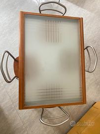 Tavolo allungabile con piano in vetro temperato