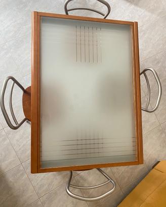 Tavolo allungabile con piano in vetro temperato