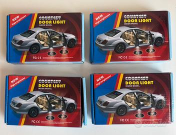 Luci LED Portiera Auto Proiettore Logo - 4 Kit