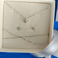 Collana punto luce e orecchini oro bianco