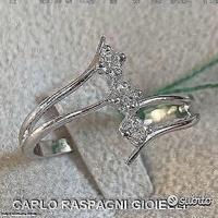 ANELLO TRILOGY ORO 18kt. CON DIAMANTI NATURALI