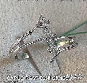 ANELLO TRILOGY ORO 18kt. CON DIAMANTI NATURALI