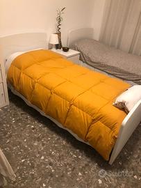 Letti singoli nuovi con struttura reti e materassi