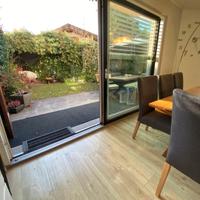 Postal casa a schiera con giardino privato