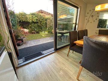 Postal casa a schiera con giardino privato