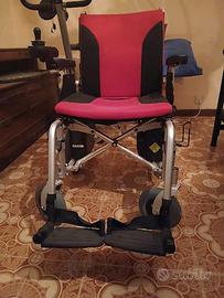 Sedia a rotelle motorizzata