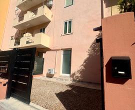 Bilocale con cortile privato e posto auto