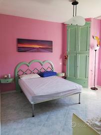 Stanza con bagno privato e cabina armadio