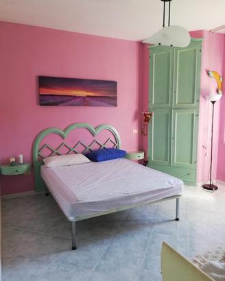 Stanza con bagno privato e cabina armadio