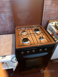Stufa quattro fornelli e forno
