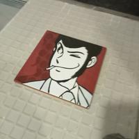 Mattonella in ceramica con disegno Lupin.