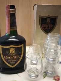 Brandy Oro Pilla con bicchieri