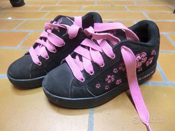 Scarpa con rotelle