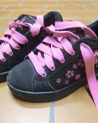 Scarpa con rotelle