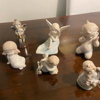 Angeli in porcellana e argento laminato