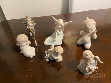 Angeli in porcellana e argento laminato