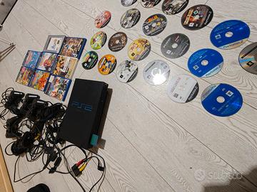 play station 2 + controller + giochi