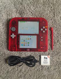 Nintendo 2DS rosso trasparente con giochi 