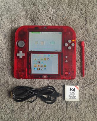Nintendo 2DS rosso trasparente con giochi 