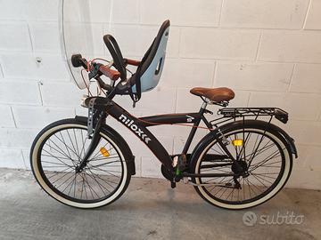 Seggiolino anteriore Thule Nexxt Mini e parabrezza