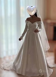 Abito da sposa splendido, con velo e sottogonna
