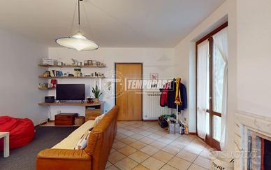 Accogliente Trilocale con Giardino Privato