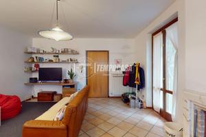Accogliente Trilocale con Giardino Privato