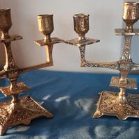 Coppia di candelabri antichi in bronzo