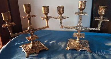 Coppia di candelabri antichi in bronzo