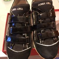 Scarpe da tennis con strappo