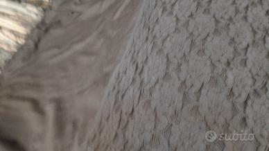 Scialle in pizzo pregato elegante.