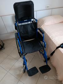 sollevatore+sedia a rotelle 