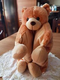 Peluche con coperta di pile