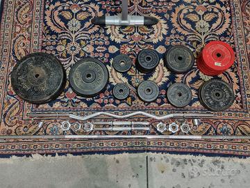 Dischi in ghisa, manubri e bilancieri